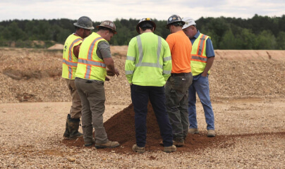 Inpecting dirt pile at Wilco