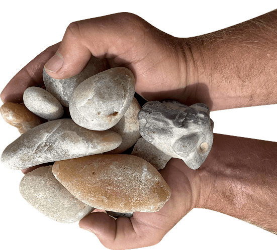 hands holding premium landscaping rock
